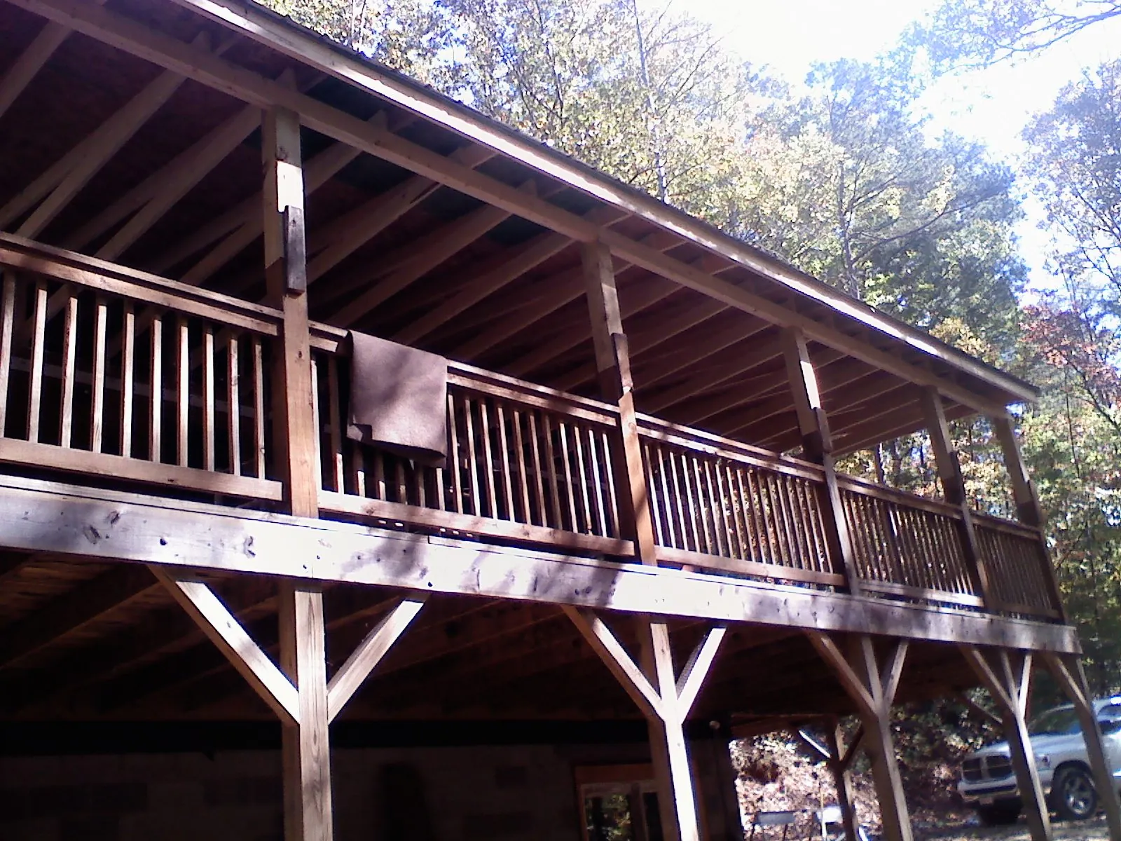 Timber framing under a new elevated porch and deck — Roof Leak Repair in Bishop Hill by Roofing Brothers